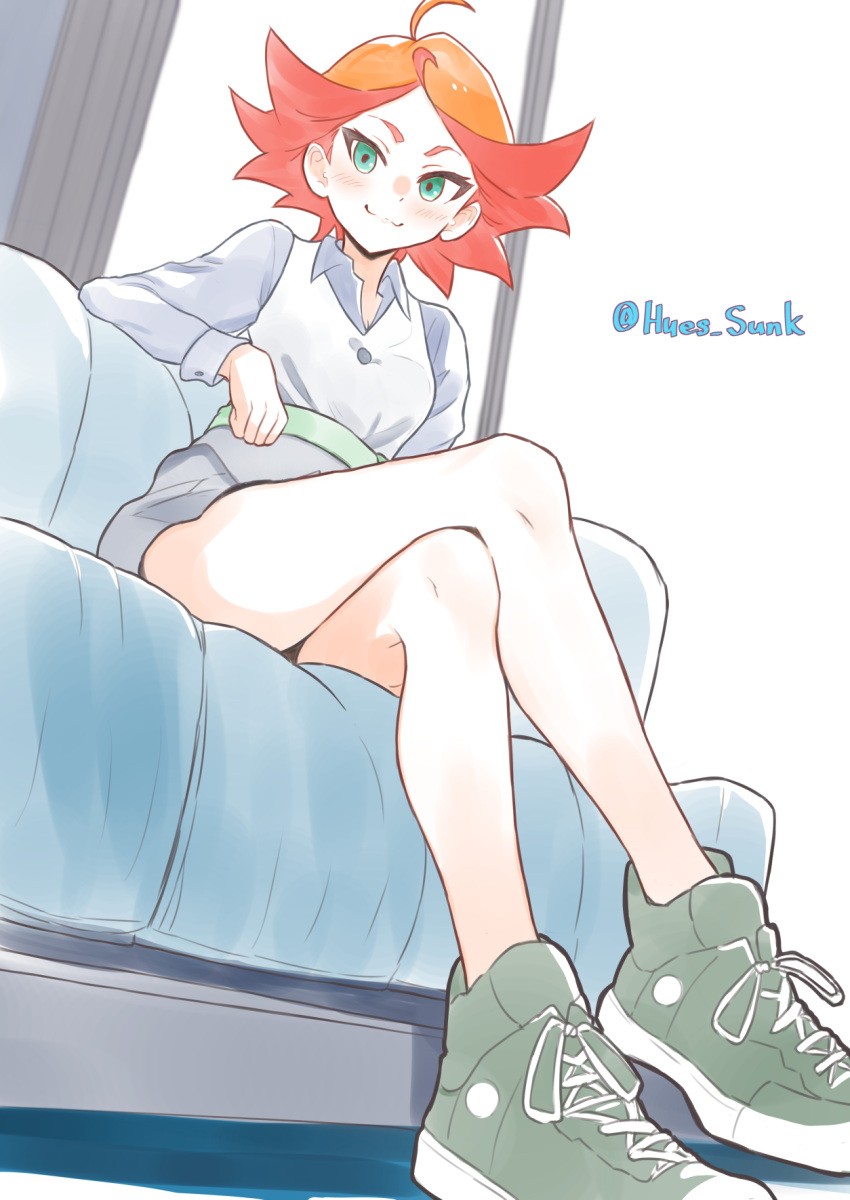 1girl :3 ahoge amanda_o'neill blush breasts closed_mouth couch crossed_legs domdom green_eyes highres indoors little_witch_academia looking_at_viewer on_couch orange_hair short_hair signature sitting small_breasts smile solo