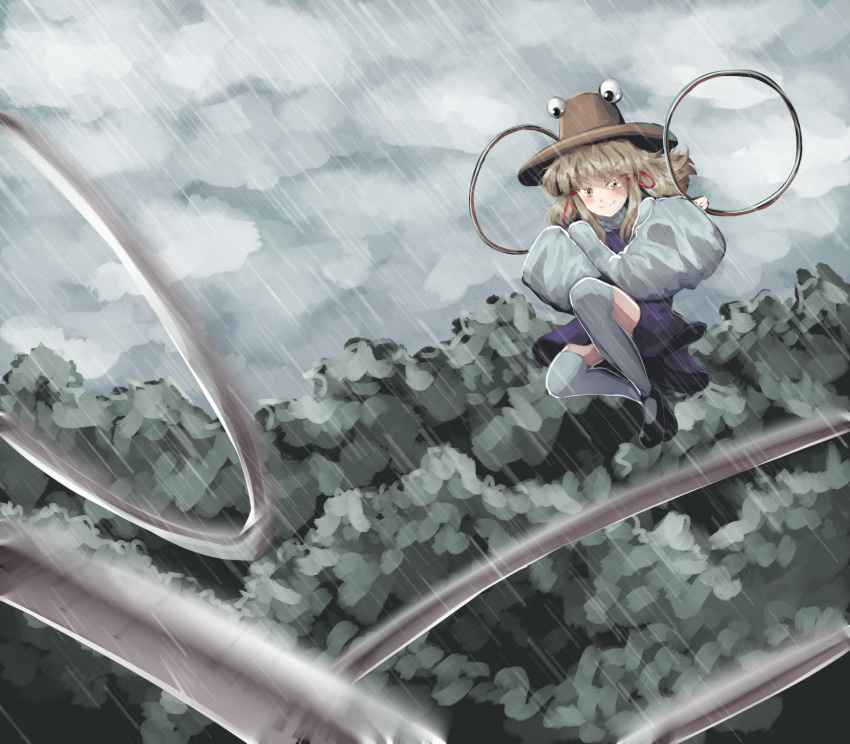 &gt;:) 1girl aiming_at_viewer attack bangs black_footwear blonde_hair blush child closed_mouth cloud eyebrows eyebrows_visible_through_hair grey_sky hair_ribbon hat headwear highres holding hoop legs_up long_sleeves looking_at_viewer mary_janes medium_hair moriya_suwako open_eyes outdoors purple_skirt pyonta rain red_ribbon ribbon shirt shoes skirt sky smile solo spell_card sunyup thighhighs throwing touhou tree v-shaped_eyebrows white_legwear wide_sleeves zettai_ryouiki