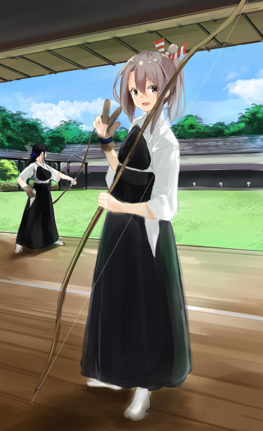 2girls :d absurdres alternate_costume archery black_hair black_hakama bow_(weapon) brown_eyes brown_gloves brown_hair full_body gloves hachimaki hair_between_eyes hakama headband high_ponytail highres holding holding_bow_(weapon) holding_weapon japanese_clothes kantai_collection kyuudou long_hair multiple_girls muneate open_mouth partly_fingerless_gloves single_glove smile solo_focus v weapon yugake zarashi zuihou_(kantai_collection)