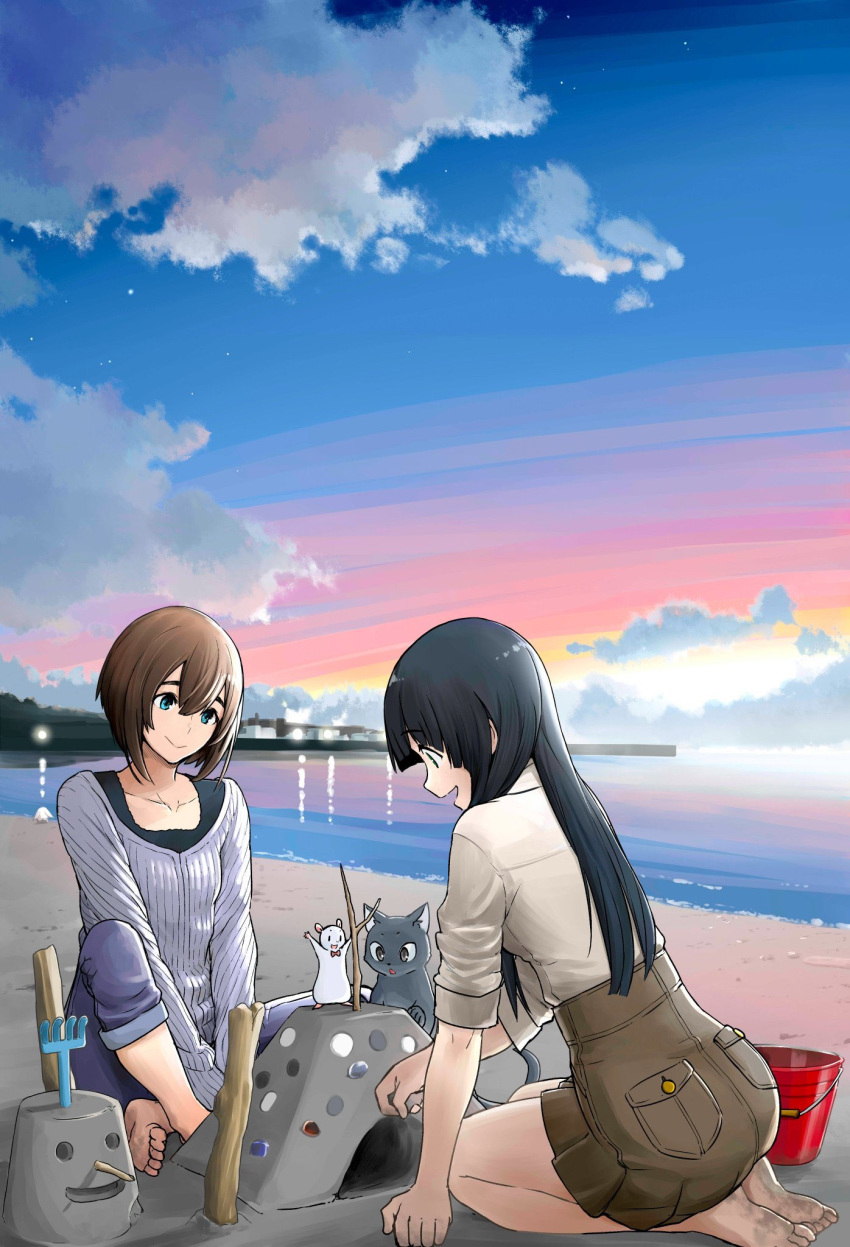 2girls al_(flying_witch) barefoot beach butterfly_sitting cat chito_(flying_witch) cloud cloudy_sky denim eyebrows eyebrows_visible_through_hair flying_witch gradient_sky hamster high-waist_skirt highres inukai_(flying_witch) ishizuka_chihiro jeans kowata_makoto landscape multiple_girls ocean outdoors pants pocket sand sand_castle sand_sculpture seiza sitting skirt sky sunset