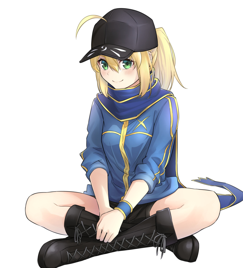 1girl ahoge artoria_pendragon_(all) baseball_cap black_footwear black_headwear black_shorts blonde_hair blue_jacket blue_scarf boots cross-laced_footwear fate/grand_order fate_(series) green_eyes hair_through_headwear hat highres jacket knee_boots lace-up_boots lotus_position mysterious_heroine_x revision scarf shorts simple_background sitting smile solo track_jacket tsurupy white_background