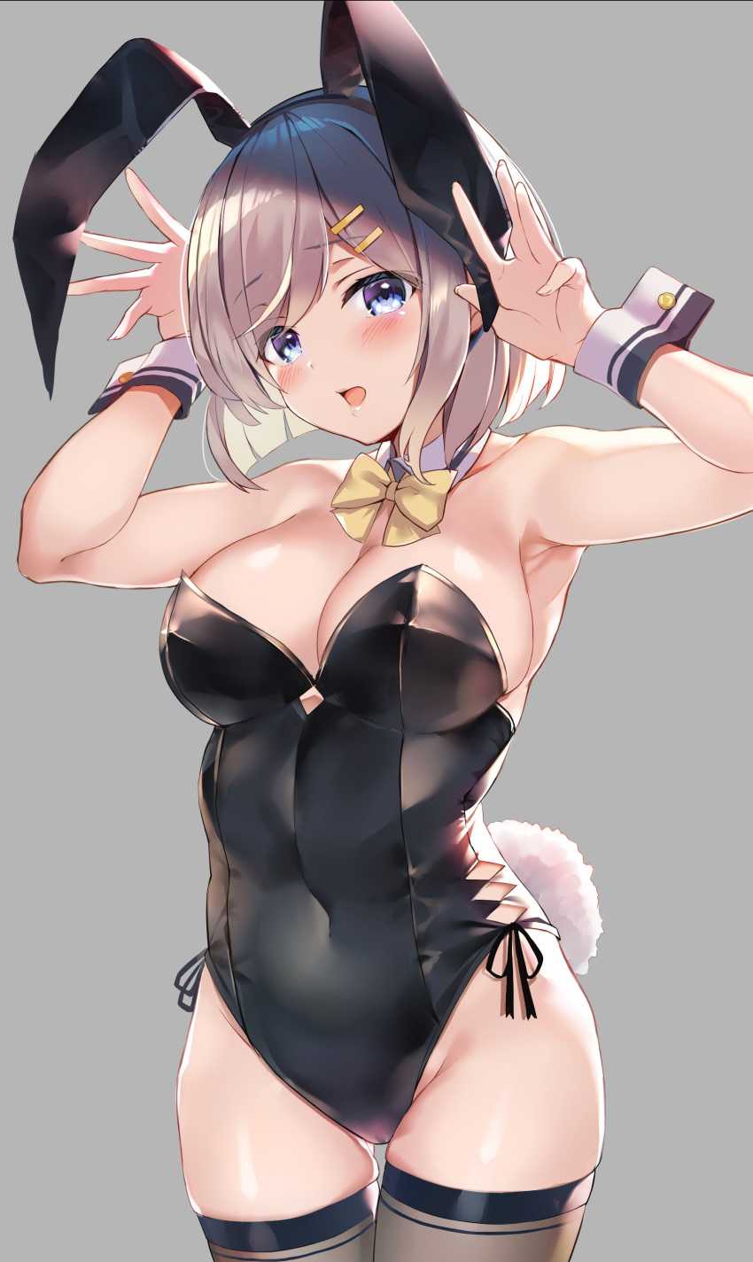 1girl absurdres animal_ears armpits arms_up bangs bare_arms bare_shoulders black_leotard blue_eyes blush breasts bunny_ears bunny_tail bunnysuit cleavage detached_collar eyebrows_visible_through_hair fake_animal_ears grey_background grey_legwear hair_ornament hairclip hamakaze_(kantai_collection) highres kantai_collection large_breasts leotard monoto open_mouth short_hair silver_hair simple_background skindentation solo tail thighhighs yellow_neckwear