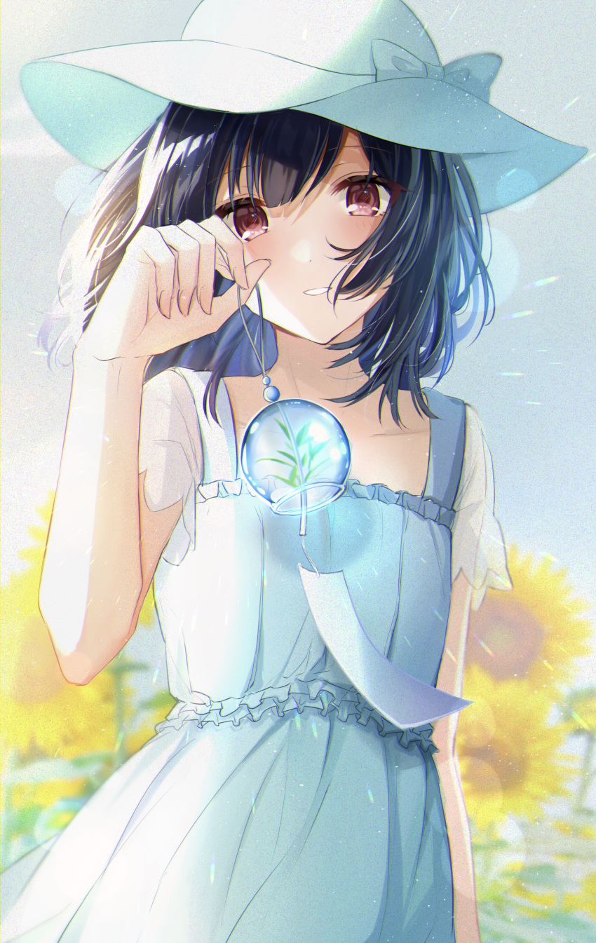 1girl absurdres bangs black_hair blue_dress blue_headwear bow commentary_request dress flower hair_blowing hat hat_bow highres holding idolmaster idolmaster_shiny_colors lens_flare looking_at_viewer medium_hair morino_rinze paper red_eyes satoimo_chika short_sleeves smile standing sun_hat sunflower wind_chime