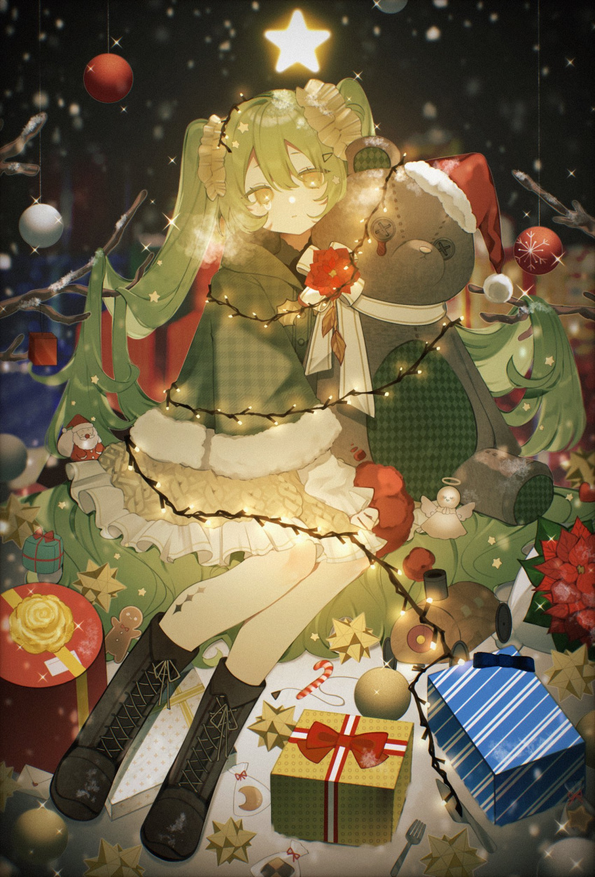 1girl black_footwear box checkered_clothes checkered_jacket christmas_ornaments cross-laced_footwear fur-trimmed_jacket fur_trim gift gift_box green_hair green_jacket hair_ornament hair_scrunchie hat hatsune_miku highres jacket long_hair nekosa santa_hat scrunchie sitting solo stuffed_animal stuffed_toy teddy_bear very_long_hair vocaloid yellow_eyes