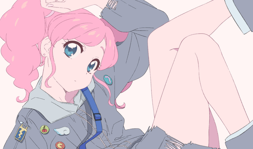 1girl aikatsu! aikatsu!_(series) amahane_madoka badge bare_legs blue_eyes curly_hair ear_piercing expressionless from_side grey_jacket grey_shorts hand_on_own_head head_tilt highres jacket knee_up leg_up long_sleeves looking_at_viewer medium_hair piercing pink_hair reclining semham shorts sidelocks simple_background solo torn_clothes torn_shorts torn_sleeves twintails white_background