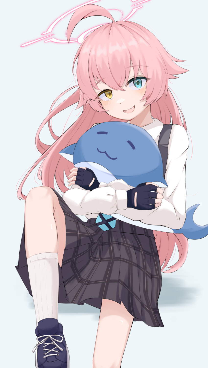 1girl absurdres ahoge black_footwear black_gloves black_skirt blue_archive blue_eyes blue_necktie commentary_request fingerless_gloves foot_out_of_frame gloves grey_background hair_between_eyes hair_flaps halo heterochromia highres hoshino_(blue_archive) hugging_doll hugging_object long_hair long_sleeves necktie open_mouth pink_hair pink_halo plaid plaid_skirt puffy_long_sleeves puffy_sleeves shadow shirt shoulder_strap simple_background skirt smile socks stuffed_animal stuffed_toy stuffed_whale sugarplus white_shirt white_socks yellow_eyes