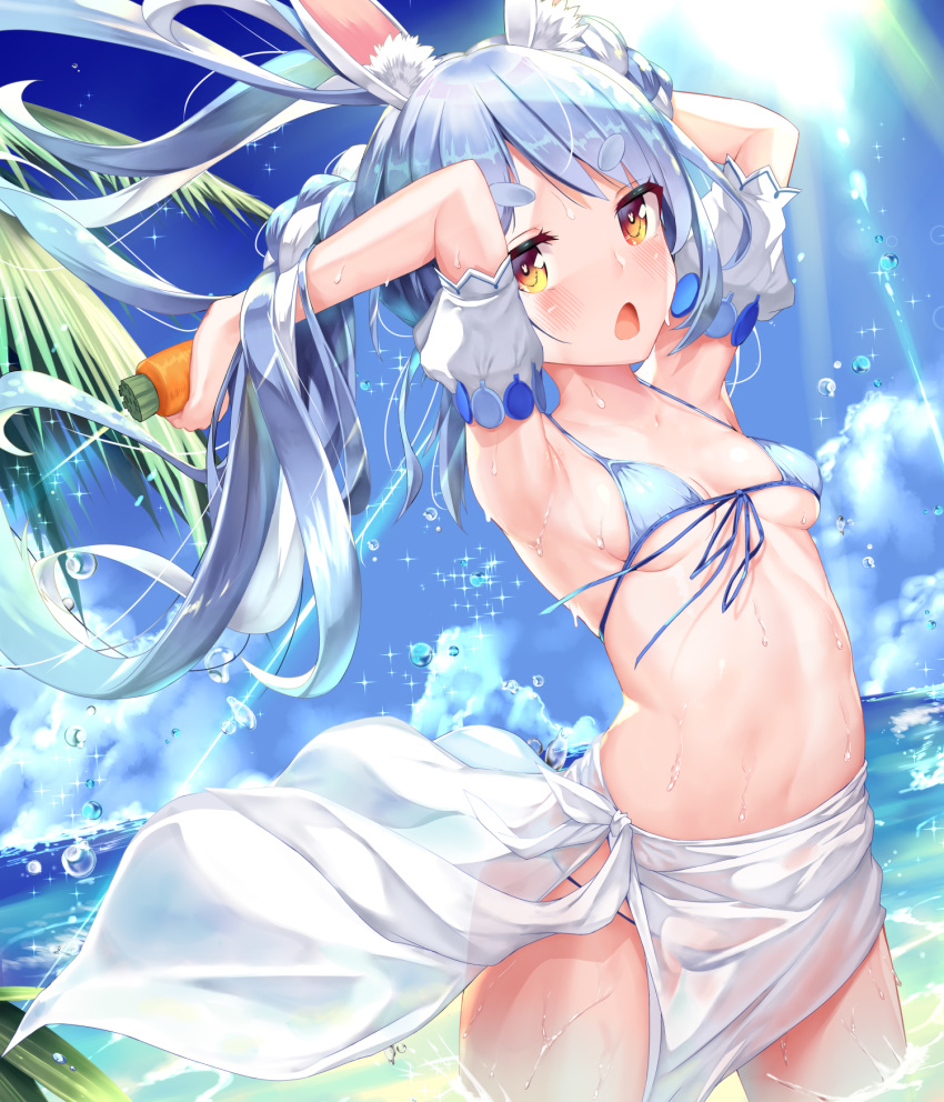 1girl animal_ear_fluff animal_ears arm_cuffs armpits arms_up beach bikini blue_bikini blue_hair blue_sky blush braid breasts bunny-shaped_pupils bunny_ears carrot cloud day eyebrows_visible_through_hair front-tie_bikini front-tie_top highres hololive long_hair looking_at_viewer medium_breasts mogmog multicolored_hair navel ocean open_mouth outdoors palm_tree sarong sky solo standing swimsuit thick_eyebrows tree twin_braids two-tone_hair usada_pekora virtual_youtuber wading water white_hair