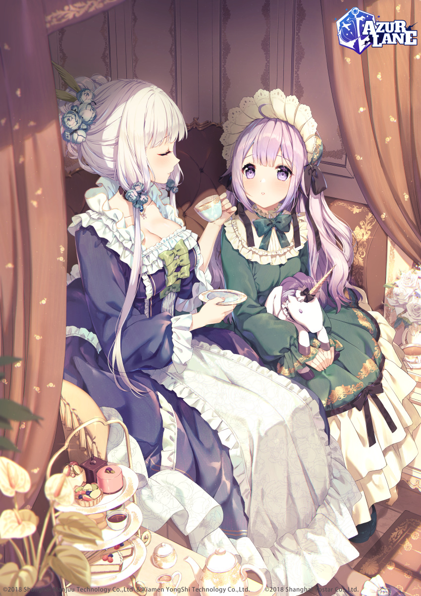 2girls :o absurdres ahoge alternate_costume apron azur_lane bangs black_ribbon blush bow bowtie breasts cake cake_slice cleavage closed_eyes commentary copyright_name cup curtains doll_hug dress dress_bow flower food frilled_apron frilled_dress frilled_sleeves frills green_bow green_dress green_neckwear hair_flower hair_ornament headdress highres holding holding_cup holding_plate holding_stuffed_animal illustrious_(azur_lane) indoors large_breasts long_dress long_hair long_sleeves looking_at_another multiple_girls object_hug parted_bangs plate purple_eyes purple_hair ribbon rosuuri sitting stuffed_animal stuffed_toy stuffed_unicorn tagme tea teacup teapot unicorn_(azur_lane) waist_apron white_flower wide_sleeves