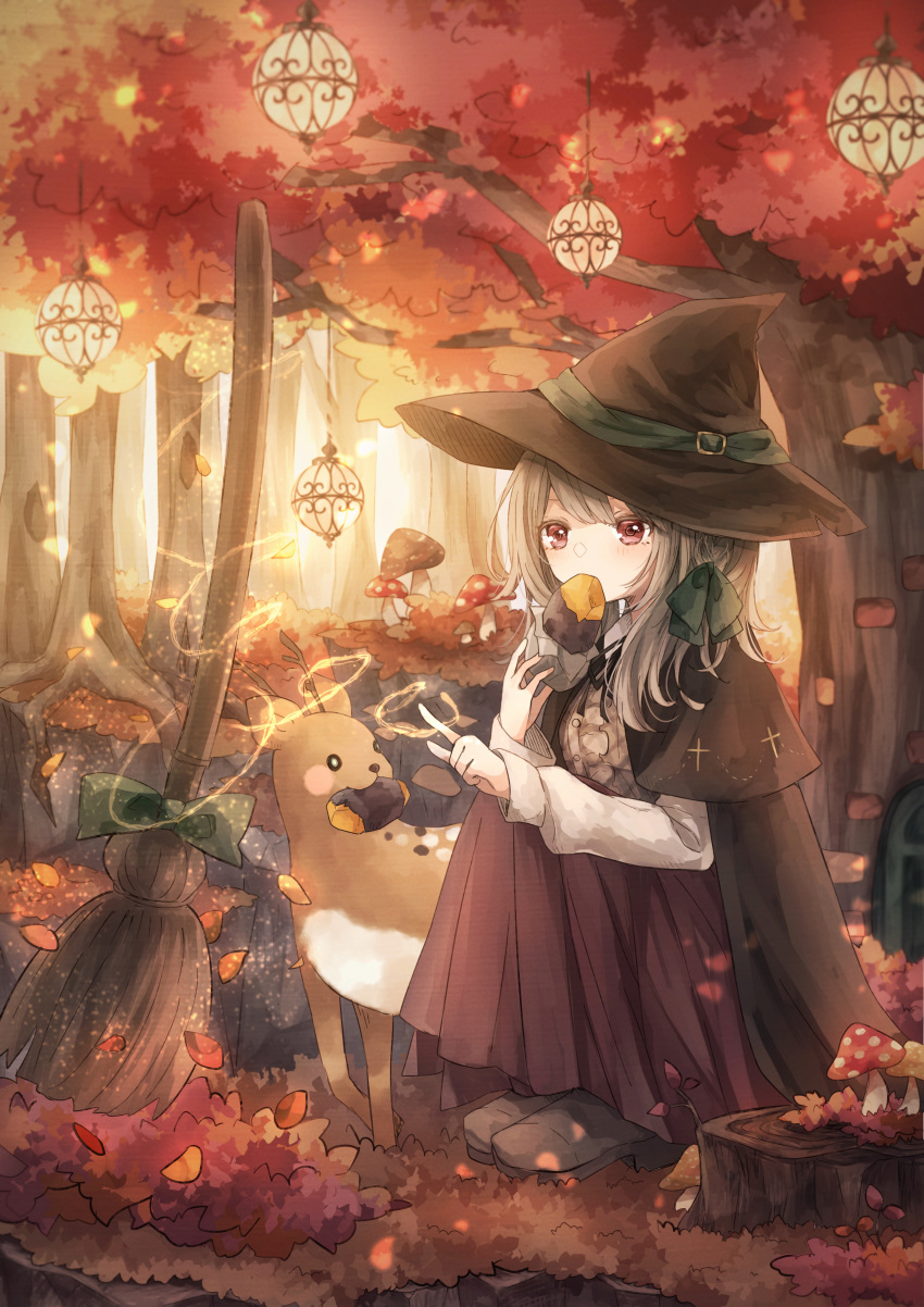 1girl absurdres animal autumn autumn_leaves blush_stickers broom cape commentary day deer eating fantasy food forest hat highres huge_filesize lantern magic mushroom nature original outdoors pink_eyes silver_hair sitting sweeping sweet_potato tukimisou0225 witch witch_hat yakiimo