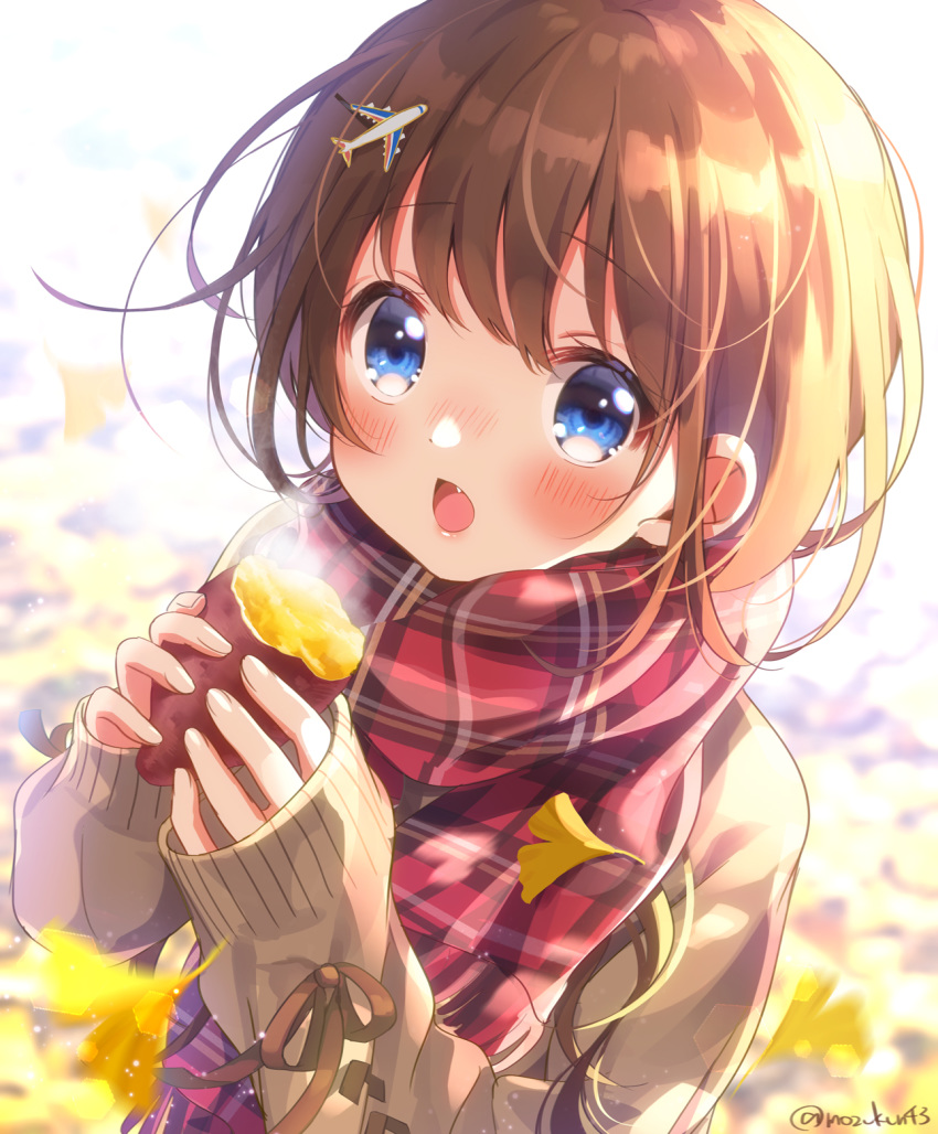 1girl airplane_hair_ornament blue_eyes blush brown_hair eyebrows_visible_through_hair fang food hair_ornament highres holding holding_food long_hair long_sleeves looking_at_viewer mozukun43 open_mouth original red_scarf scarf solo twitter_username upper_body