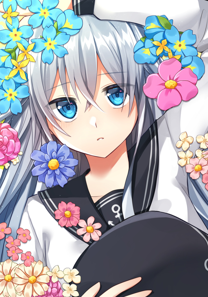 1girl anchor_symbol black_headwear black_sailor_collar blue_eyes blue_flower blush eyebrows_visible_through_hair flat_cap flower hair_between_eyes hat hibiki_(kantai_collection) highres holding holding_clothes holding_hat kantai_collection katsuobushi_(eba_games) long_hair long_sleeves looking_at_viewer parted_lips pink_flower sailor_collar school_uniform serafuku silver_hair solo upper_body yellow_flower