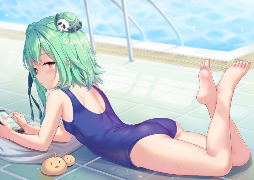 1girl ass back bangs bare_shoulders barefoot bird blue_swimsuit blush breasts cellphone chick commentary_request double_bun green_hair hair_ornament hair_ribbon hololive legs looking_at_viewer looking_back lying on_stomach parted_lips phone piyoko_(uruha_rushia) poolside red_eyes ribbon shimokirin short_hair shoulder_blades sidelocks skull_hair_ornament swimsuit the_pose uruha_rushia virtual_youtuber