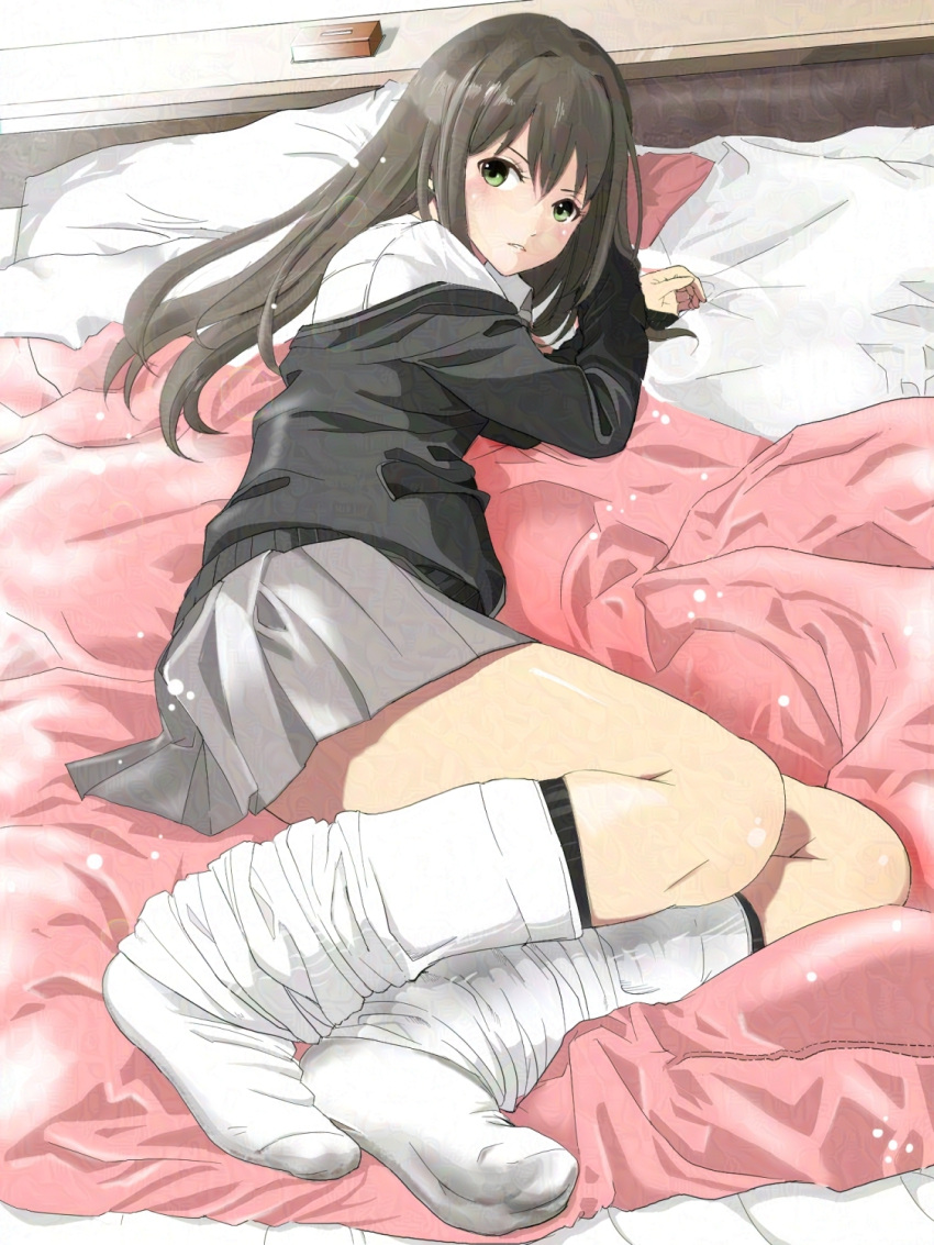 1girl bed_sheet black_cardigan blush breasts brown_hair cardigan closed_mouth feet green_eyes grey_skirt highres idolmaster idolmaster_cinderella_girls idolmaster_cinderella_girls_starlight_stage indoors light_particles long_hair long_sleeves looking_at_viewer loose_socks lying medium_breasts miniskirt nao3675 no_shoes off_shoulder on_bed on_side parted_lips pillow pleated_skirt school_uniform shibuya_rin shirt skirt socks solo white_shirt white_socks