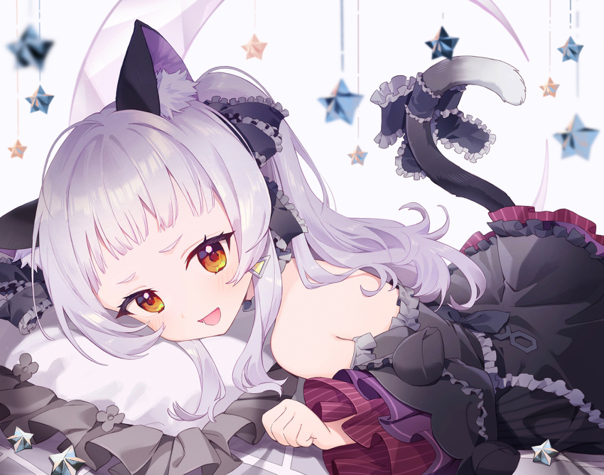 1girl animal_ears bangs blunt_bangs blush bow cat_ears cat_girl cat_tail chain_print detached_sleeves dress dress_bow frilled_dress frills gothic_lolita hair_ribbon hololive layered_dress lolita_fashion long_hair looking_at_viewer lying murasaki_shion on_stomach open_mouth pillow ribbon short_eyebrows sidelocks silver_hair sleeveless sleeveless_dress smile solo star_(symbol) tail tail_bow tail_ornament tugo virtual_youtuber wide_sleeves yellow_eyes