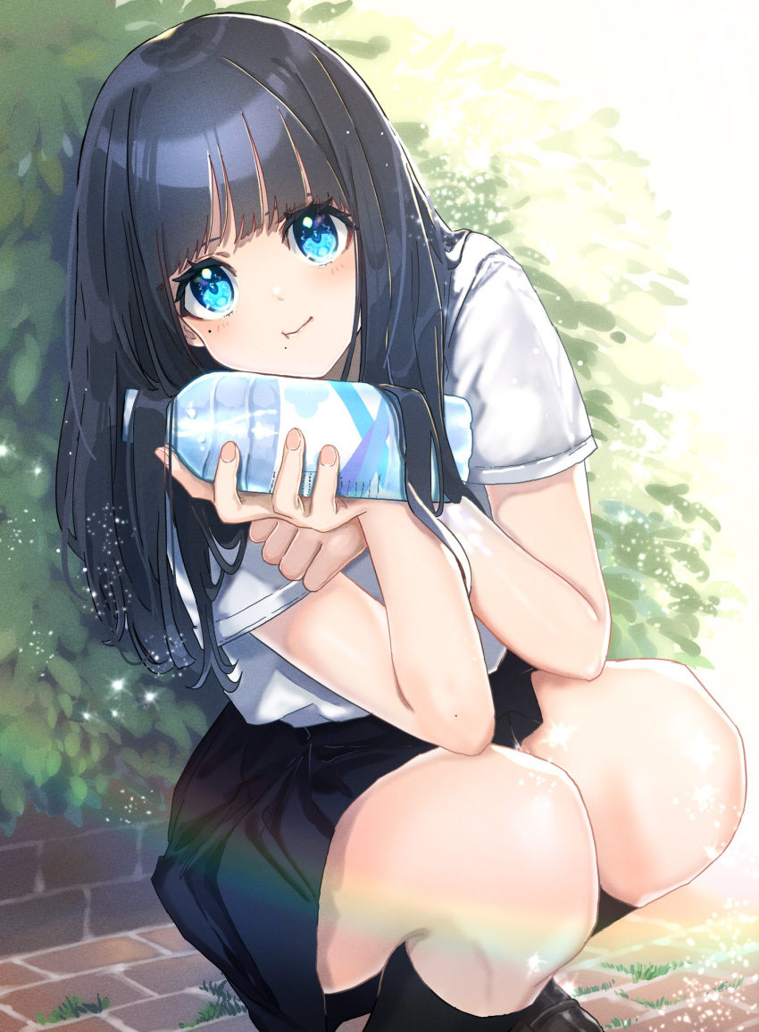 1girl :t bare_arms black_hair black_legwear black_skirt blue_eyes bottle brick_road bush closed_mouth commentary_request day highres holding holding_bottle kneehighs lens_flare light_particles long_hair looking_at_viewer mole mole_under_eye nanaponi original outdoors school_uniform shirt short_sleeves skirt solo sparkle squatting sunlight water_bottle white_shirt