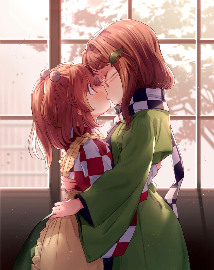 2girls apron bell blush brown_hair checkered checkered_kimono checkered_scarf closed_eyes eyebrows_visible_through_hair french_kiss futatsuiwa_mamizou futatsuiwa_mamizou_(human) glasses green_vest hair_bobbles hair_ornament highres japanese_clothes kimono kiss leaf leaf_on_head long_hair long_sleeves masanaga_(tsukasa) motoori_kosuzu multiple_girls orange_hair scarf touhou twintails vest wide_sleeves window yuri