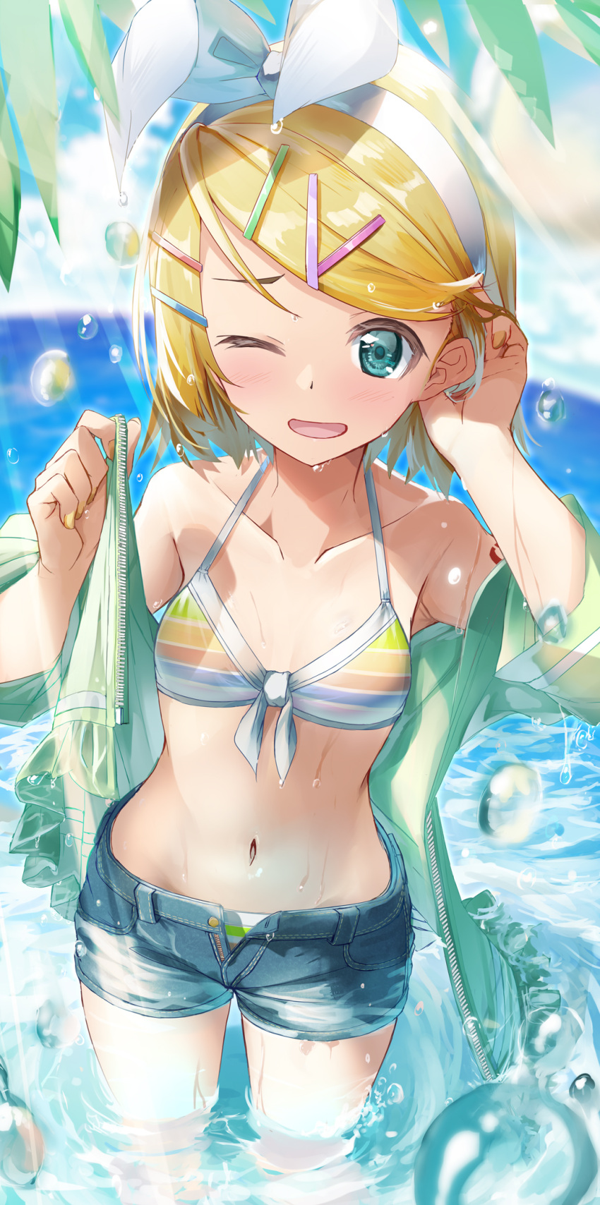 1girl :d aqua_eyes arm_up bikini blonde_hair blue_sky bow breasts cloud collarbone commentary curved_horizon daidou_(demitasse) day denim denim_shorts green_jacket hair_bow hair_ornament hairclip highres jacket kagamine_rin leaf light_rays nail_polish navel ocean one_eye_closed open_mouth outdoors short_hair shorts sky small_breasts smile solo standing striped striped_bikini sunbeam sunlight swimsuit thighs unbuttoned vocaloid wading water_drop wet
