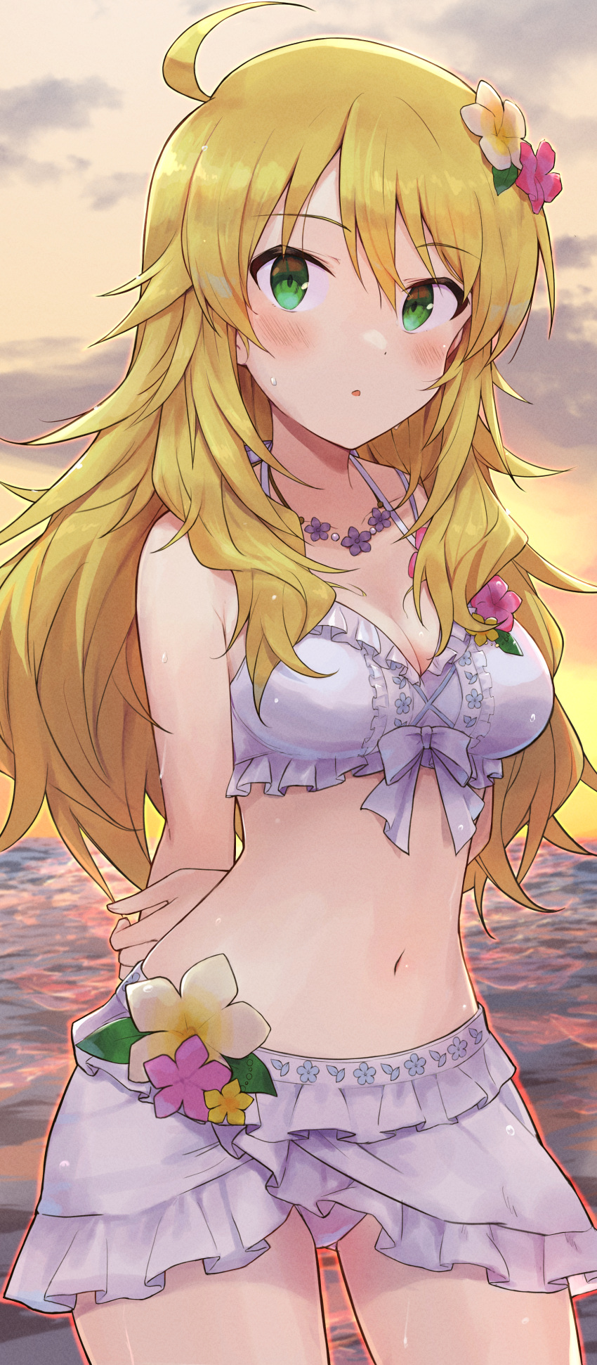 1girl :o absurdres ahoge arms_behind_back ass_visible_through_thighs backlighting bangs bare_shoulders bikini bikini_skirt blonde_hair blush breasts cleavage cowboy_shot eyebrows_visible_through_hair flower flower_necklace frilled_bikini frills green_eyes hair_flower hair_ornament highres hoshii_miki idolmaster idolmaster_(classic) idolmaster_million_live! jewelry looking_at_viewer medium_breasts navel necklace ocean parted_lips shuucream_(syuichi) solo stomach sunlight swimsuit twilight water white_bikini yellow_sky