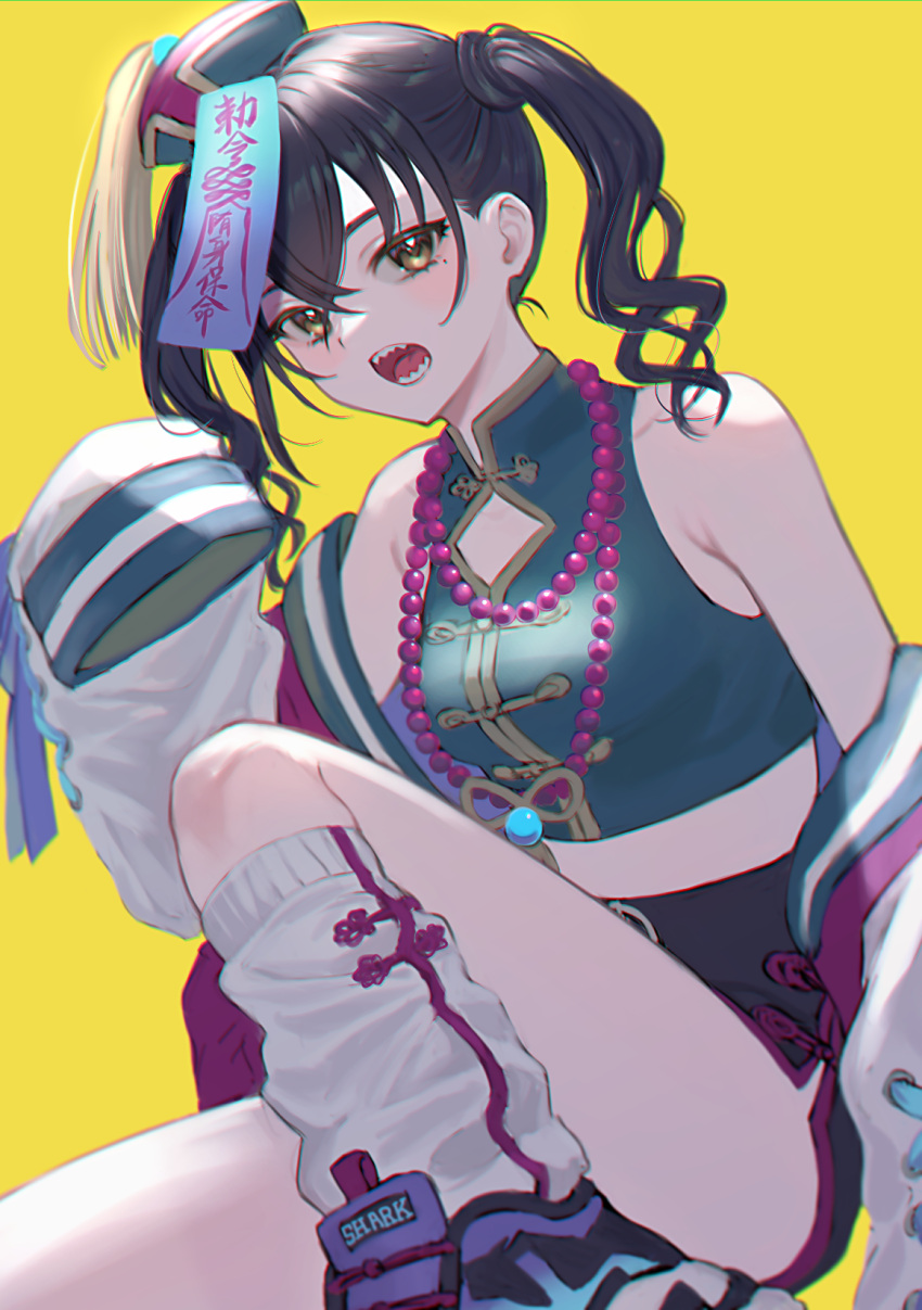 1girl anoa black_hair blue_headwear breasts chinese_clothes hat highres idolmaster idolmaster_cinderella_girls jewelry jiangshi_costume looking_at_viewer loose_socks medium_breasts midriff mole mole_under_eye necklace ofuda open_mouth sharp_teeth short_hair simple_background sitting sleeves_past_fingers sleeves_past_wrists socks solo sunazuka_akira teeth twintails yellow_background yellow_eyes