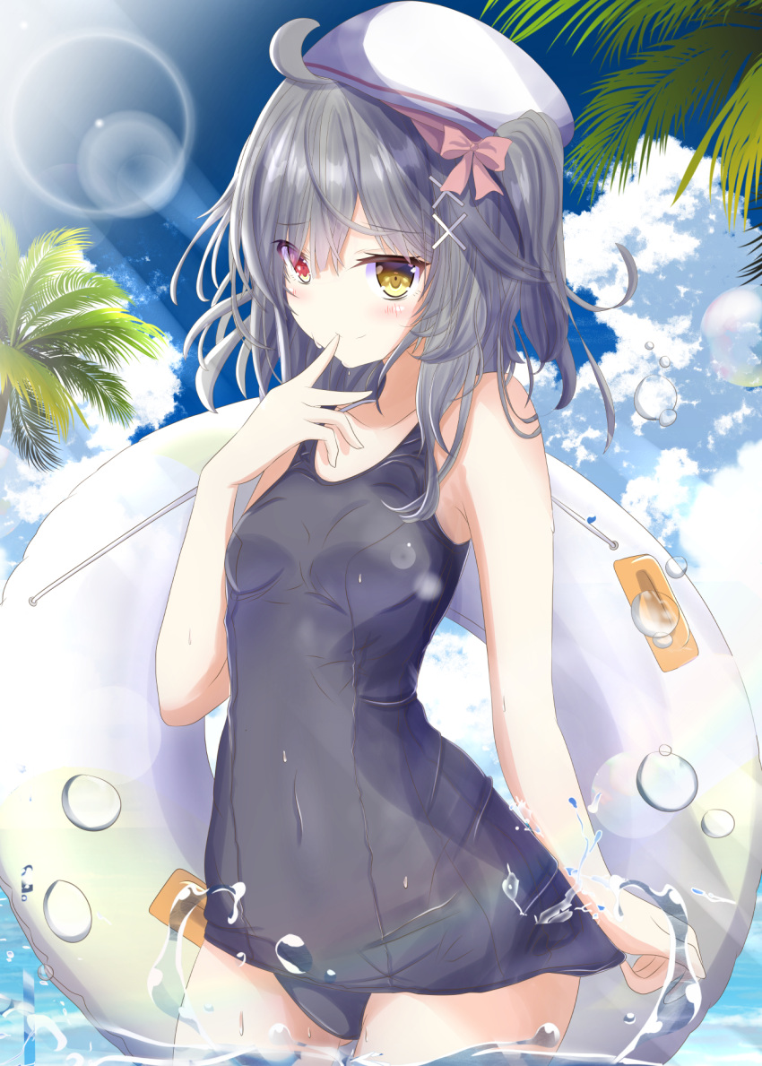 1girl ahoge aruka_(alka_p1) beret black_hair blush bow breasts cloud cowboy_shot finger_to_mouth hair_between_eyes hair_ornament hat heterochromia highres innertube lens_flare medium_hair one-piece_swimsuit original outdoors palm_tree pink_bow red_eyes school_swimsuit sky small_breasts solo standing swimsuit tree water white_headwear x_hair_ornament yellow_eyes