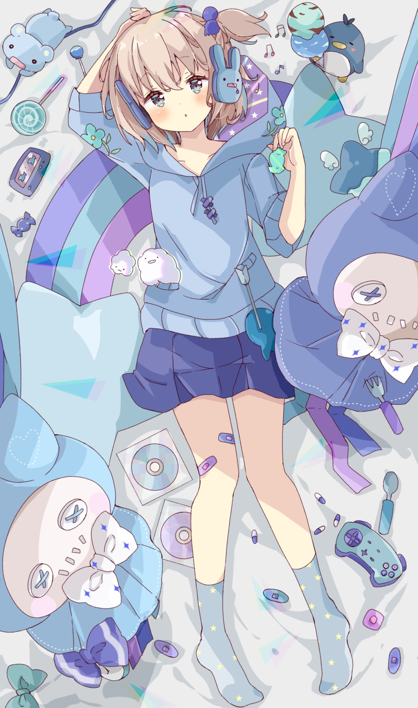 1girl :o absurdres arm_up arrow_(projectile) bandaid beamed_eighth_notes beamed_sixteenth_notes bed_sheet blue_hoodie blue_legwear blue_skirt blush bow brown_hair bunny_headphones candy cd cd_case commentary controller double_scoop drawstring food game_controller grey_eyes hair_bobbles hair_ornament headphones highres holding hood hood_down hoodie ice_cream lollipop long_sleeves lying musical_note no_shoes on_back one_side_up original parted_lips pleated_skirt print_legwear short_sleeves skirt socks spoon star_(symbol) star_print swirl_lollipop symbol-only_commentary tsukiyo_(skymint) white_bow