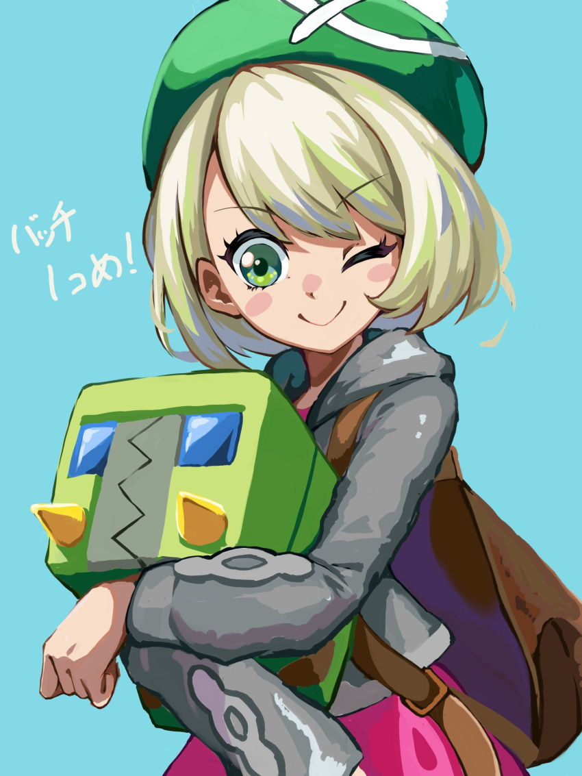 1girl alternate_eye_color alternate_hair_color aqua_background backpack bag bangs blonde_hair blush_stickers bob_cut brown_bag cable_knit cardigan charjabug closed_mouth commentary_request dress eyebrows_visible_through_hair eyelashes gloria_(pokemon) green_eyes green_headwear grey_cardigan hat highres holding holding_pokemon hooded_cardigan one_eye_closed pink_dress pokemon pokemon_(creature) pokemon_(game) pokemon_swsh short_hair sireia_round smile tam_o'_shanter