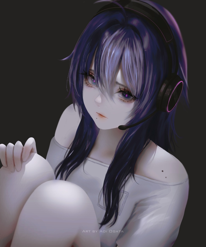 1girl ahoge aoi_ogata artist_name black_background clip_studio_paint_(medium) closed_mouth commentary english_commentary eyebrows_hidden_by_hair feet_out_of_frame hair_between_eyes hand_on_own_knee headphones headset highres knees_up long_hair looking_at_viewer mole mole_under_mouth off_shoulder original purple_eyes purple_hair shirt simple_background sitting solo white_shirt