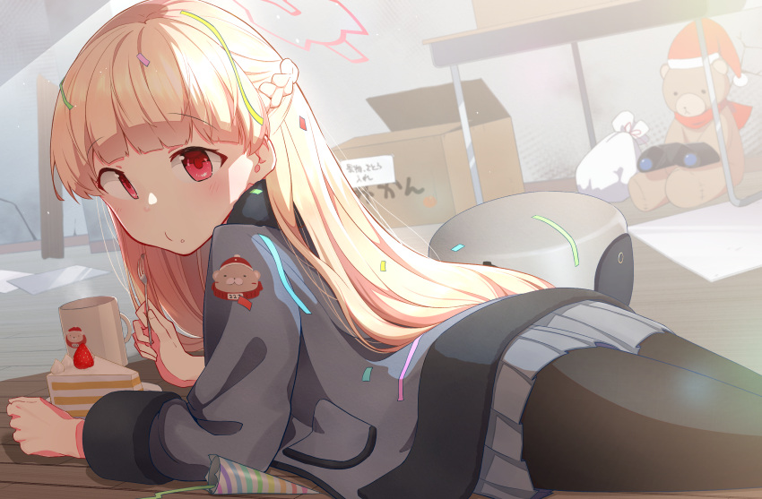1girl binoculars black_legwear blonde_hair blue_archive blush box cake cake_slice confetti cup eyebrows_visible_through_hair feet_out_of_frame food food_on_face fork fruit fur-trimmed_jacket fur_trim grey_jacket half_updo halo hat highres holding holding_fork indoors jacket ki_no_nekko long_hair looking_at_viewer lying miniskirt mug nodoka_(blue_archive) on_stomach one_side_up pantyhose party_popper pleated_skirt red_eyes santa_hat skirt solo strawberry stuffed_animal stuffed_toy sunlight table teddy_bear