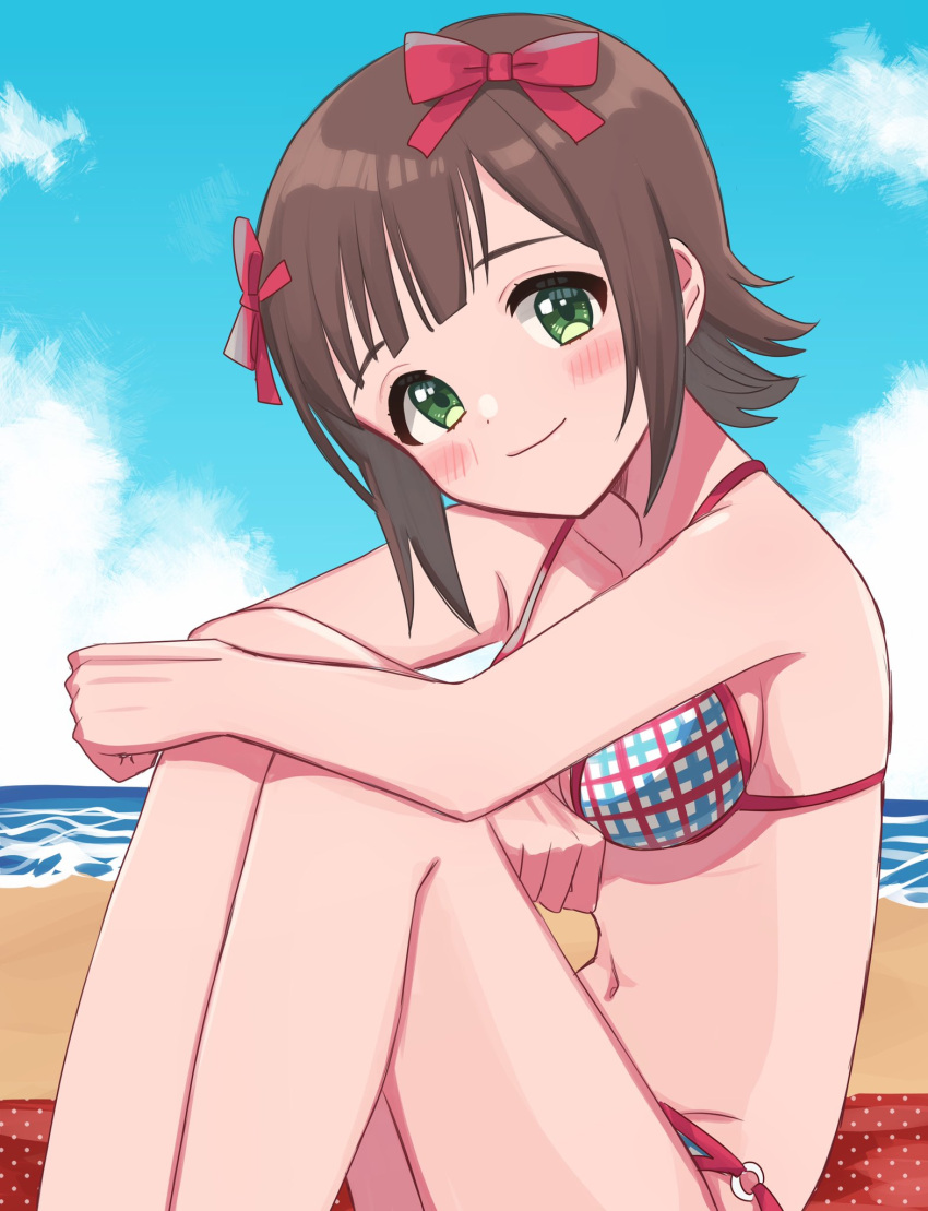 amami_haruka bangs beach bikini blush breasts brown_hair checkered_bikini checkered_clothes clenched_hands collarbone commentary_request eyebrows green_eyes hair_ribbon highres idolmaster idolmaster_(classic) legs looking_at_viewer medium_breasts navel ocean polka_dot red_ribbon ribbon saito_katuo short_hair sitting smile stomach swimsuit tagme