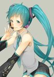  detached_sleeves eyelashes face hands hatsune_miku highres lips long_hair microphone momoiro_oji necktie smile solo twintails very_long_hair vocaloid 