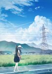  1girl absurdres arms_at_sides barefoot black_hair blue_sky brown_jacket building cloud commentary_request contrail cumulonimbus_cloud day feet field guitar_case highres hill instrument_case jacket kumagaya_nono landscape long_hair mountain original outdoors power_lines rice_paddy road rural scenery shirt sidewalk sky toes transmission_tower walking white_headwear white_shirt 