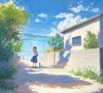  1girl arm_up blue_sky building carrying carrying_bag cat cloud cloudy_sky fjsmu highres ocean original power_lines scenery school_uniform serafuku shadow shirt skirt sky tree utility_pole water waving white_shirt wide_shot 