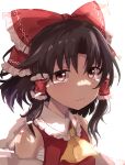  1girl ascot backlighting bangs bare_shoulders blush bow brown_hair crying crying_with_eyes_open eyebrows_visible_through_hair hair_bow hair_tubes hakurei_reimu highres red_bow red_eyes sarashi sidelocks simple_background solo tears tigern touhou upper_body white_background 