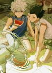  2boys black_hair blue_eyes boombox bug cassette_tape electric_fan food fruit gon_freecss green_shorts highres holding holding_food hunter_x_hunter indoors insect_wings killua_zoldyck male_focus messy messy_room multiple_boys on_floor plate shirt short_hair short_sleeves shorts spiked_hair stereo tape to_e watermelon white_hair wings 