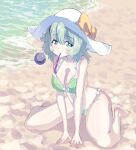  1girl bangs beach bikini bow breasts bright_pupils cleavage eyebrows_visible_through_hair full_body green_bikini green_eyes green_hair hat hat_bow highres in_mouth komeiji_koishi large_breasts looking_at_viewer ocean outdoors short_hair sitting solo sunnysideup swimsuit third_eye touhou white_headwear white_pupils yellow_bow 