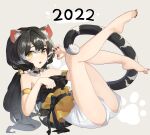  1girl 2022 absurdres armlet bell black_hair black_nails breasts cat_girl cat_tail detached_collar feet full_body hair_bell hair_ornament highres long_hair looking_at_viewer lying medium_breasts multicolored_hair nail_polish on_back open_mouth original paw_pose paw_print paw_print_background rang_go shirt shorts slit_pupils solo strapless strapless_shirt streaked_hair tail teeth toenail_polish toenails upper_teeth white_shorts 