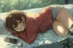  1girl bed_sheet blush brown_hair cellphone earphones gijang hair_between_eyes hair_ornament hairclip higuchi_madoka idolmaster idolmaster_shiny_colors looking_at_viewer lying outdoors parted_lips phone pillow plant purple_eyes red_sweater short_hair short_shorts shorts smartphone solo sweater white_shorts wireless_earphones 
