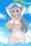  1girl areola_slip arms_behind_head bangs bikini blue_archive blue_sky breasts cleavage green_eyes grey_hair groin halo highres kazahari_kazuho large_breasts light_rays long_hair looking_at_viewer navel nonomi_(blue_archive) nonomi_(swimsuit)_(blue_archive) open_mouth outdoors partially_submerged sky solo standing swimsuit untied untied_bikini white_headwear yellow_bikini 