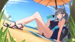  1girl absurdres animal_ears arm_support bag beach_towel beach_umbrella blue_archive blue_eyes bottle breasts closed_mouth competition_swimsuit covered_navel full_body grey_hair hair_ornament highres holding holding_bottle jaws_(okdol0928) knees_up long_hair looking_at_viewer medium_breasts one-piece_swimsuit outdoors ponytail sand sandals school_bag shiroko_(blue_archive) shiroko_(swimsuit)_(blue_archive) sitting solo swimsuit towel umbrella unfinished water_bottle x_hair_ornament 