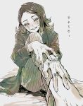  1boy blush body_writing coat enmu_(kimetsu_no_yaiba) extra_mouth facial_mark feet_out_of_frame green_theme half-closed_eyes hand_mouth hands_on_own_leg kimetsu_no_yaiba kkk_0mg knees_up long_sleeves looking_at_viewer male_focus monochrome open_mouth outstretched_arms pants short_hair simple_background smile solo text_in_eyes twitter_username 