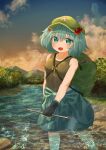  1girl absurdres backpack bag blue_hair caustics cloud cloudy_sky ekaapetto gloves green_headwear hair_bobbles hair_ornament hat highres kawashiro_nitori key mountain open_mouth river skirt sky solo sunset touhou two_side_up wading water 