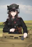  1girl absurdres animal_ears black_gloves black_jacket brown_eyes brown_hair cat_ears cross gloves highres iron_cross jacket keiita military_uniform military_vehicle motor_vehicle original reichsadler solo swastika tank tiger_i tongue tongue_out totenkopf uniform unworn_gloves wehrmacht world_war_ii 