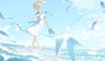  1girl bare_legs barefoot beach bird blonde_hair blue_eyes blue_sailor_collar blue_sky cloud cloudy_sky day dress from_behind hair_between_eyes hair_ornament hana_mori highres holding holding_shoes hololive horizon kazama_iroha leaf_hair_ornament long_hair looking_at_viewer looking_back ocean open_mouth outdoors ponytail ribbon sailor_collar sailor_dress sand seagull shoes short_sleeves sky smile solo splashing standing virtual_youtuber wading water waves white_dress wrist_ribbon 