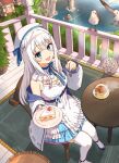  1girl beret bird blue_eyes blush breasts building cake commentary_request food grey_hair hair_ornament hat highres indie_virtual_youtuber jacket looking_at_viewer medium_breasts nagino_mashiro ocean plate seagull sitting solo table tea thighhighs virtual_youtuber x_hair_ornament yurai0739 