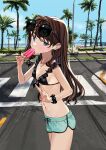  1girl bangs bare_arms bare_shoulders bikini bikini_top_only black_bikini black_scrunchie blue_eyes blue_shorts blue_sky blush brown_hair closed_mouth cloud crosswalk day eyebrows_behind_hair food frilled_bikini frills hair_intakes hand_up highres holding holding_food horizon ice_cream lamppost long_hair looking_at_viewer luicent nail_polish navel ocean original outdoors palm_tree pedestrian_crossing_sign pink_nails scrunchie short_shorts shorts sky solo swimsuit thick_eyebrows tree v very_long_hair water wrist_scrunchie 