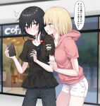  2girls arm_hug black_eyes black_hair black_shirt blonde_hair blurry blurry_background blush breasts cellphone closed_mouth cowboy_shot denim denim_shorts hair_over_shoulder hand_on_another&#039;s_arm hands_up highres holding holding_phone hood hood_down jeans long_hair looking_at_another loose_clothes loose_shirt low_ponytail medium_breasts multiple_girls open_mouth original pants phone pink_shirt piripun shirt short_hair short_sleeves shorts sideways_glance smartphone speech_bubble standing sweatdrop thighs translation_request white_shorts yellow_eyes yuri 