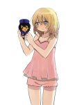  1girl andou_(girls_und_panzer) bangs bc_freedom_military_uniform blonde_hair blue_eyes blush camisole character_doll closed_mouth commentary doll frown girls_und_panzer highres holding holding_doll looking_to_the_side medium_hair messy_hair oshida_(girls_und_panzer) pink_camisole pink_shorts ri_(qrcode) short_shorts shorts simple_background sleepwear solo standing sweatdrop white_background 