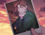  1boy absurdres commentary_request dated did_it earrings gakuran green_jacket hand_on_own_chin highres jacket jewelry jojo_no_kimyou_na_bouken kakyoin_noriaki korean_commentary male_focus open_mouth photo_(object) pov pov_hands purple_eyes red_hair school_uniform smile solo_focus sparkle stardust_crusaders sunset upper_body 