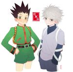  2boys backpack bag belt belt_buckle black_hair blue_eyes blush buckle closed_mouth gon_freecss green_shorts hands_in_pockets hands_on_hips highres hunter_x_hunter killua_zoldyck looking_at_viewer multiple_boys pinky_narakorn shorts smile spiked_hair white_hair 