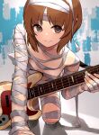  absurdres alternate_costume bandages bangs brown_eyes brown_hair girls_und_panzer guitar highres holding holding_instrument instrument kneeling looking_at_viewer mummy mummy_costume naked_bandage nishizumi_miho oshiri_seijin short_hair 